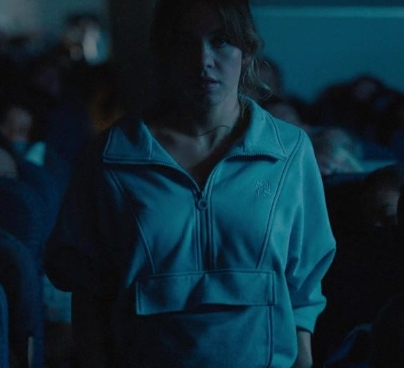 Light Blue Half-Zip Sweatshirt with High Neck and Kangaroo Pocket of Sydney Sweeney as Bea