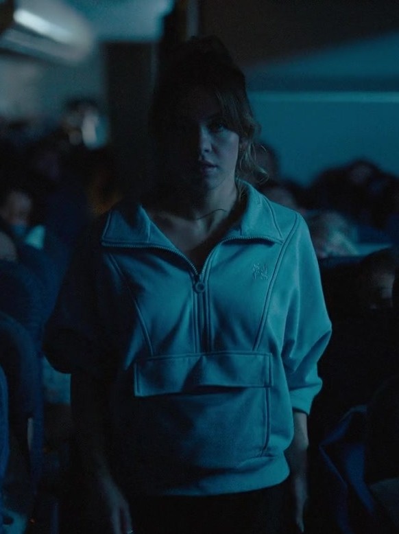 Light Blue Half-Zip Sweatshirt with High Neck and Kangaroo Pocket of Sydney Sweeney as Bea