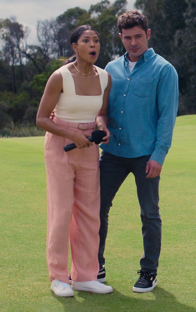 blush pink wide-leg pants - Lex Scott Davis (Erin) - Ricky Stanicky (2024) Movie