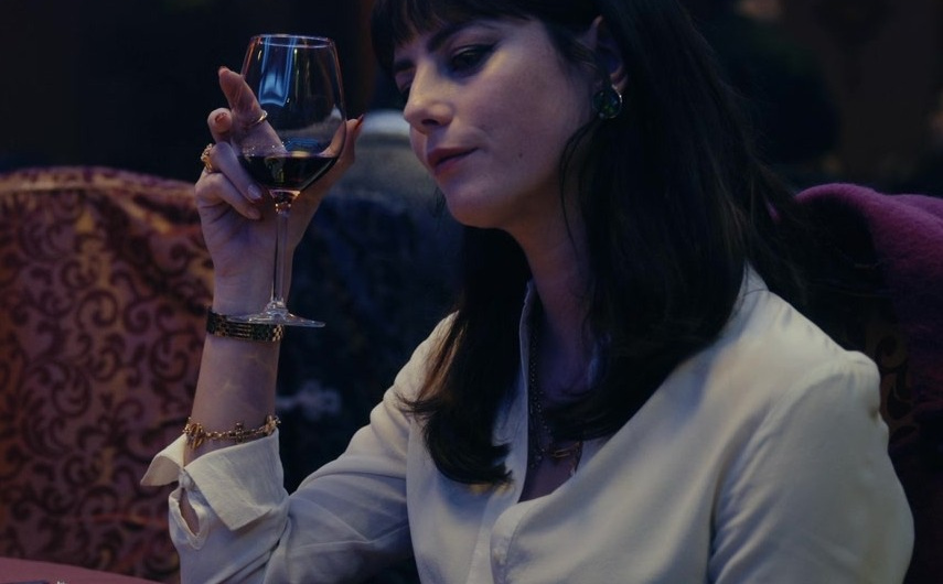 Cream Satin Shirt of Kaya Scodelario as Susie Glass