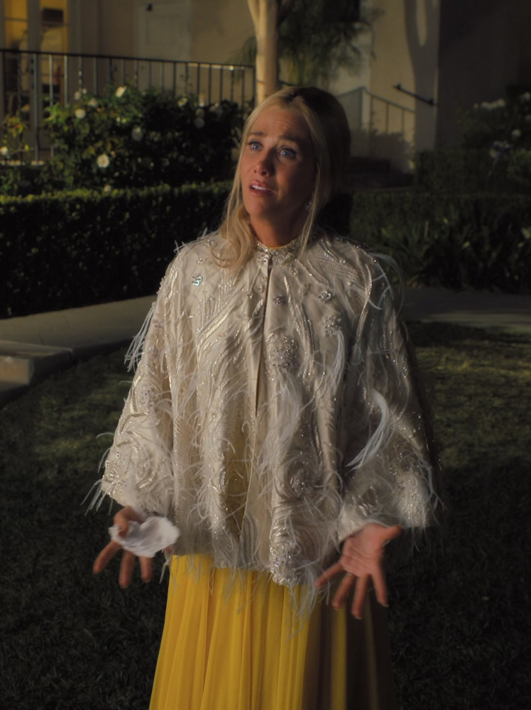 cream feathered capelet with silver beading and sheer overlay - Kristen Wiig (Maxine Simmons) - Palm Royale TV Show