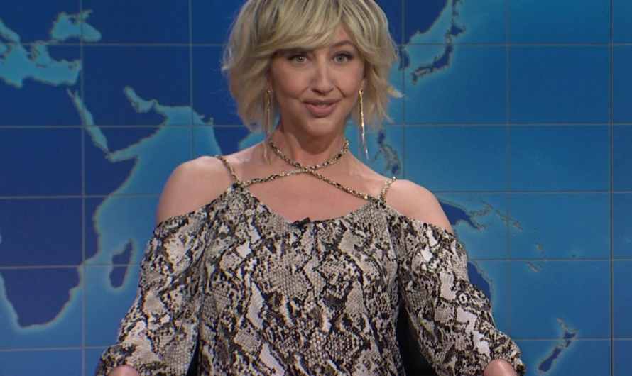 Snake Print Cold-Shoulder Top Worn by Heidi Gardner