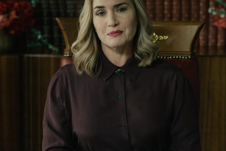 Wine-Colored Button-Down Shirt of Kate Winslet as Chancellor Elena “Lenny” Vernham