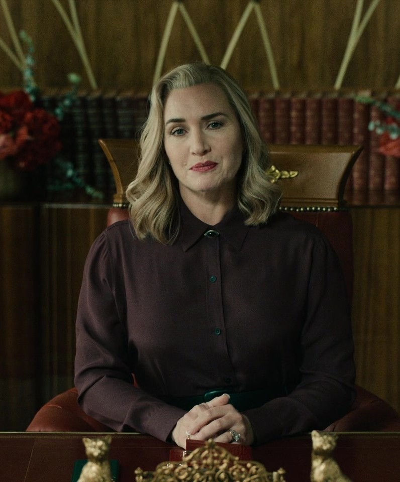 Wine-Colored Button-Down Shirt of Kate Winslet as Chancellor Elena "Lenny" Vernham