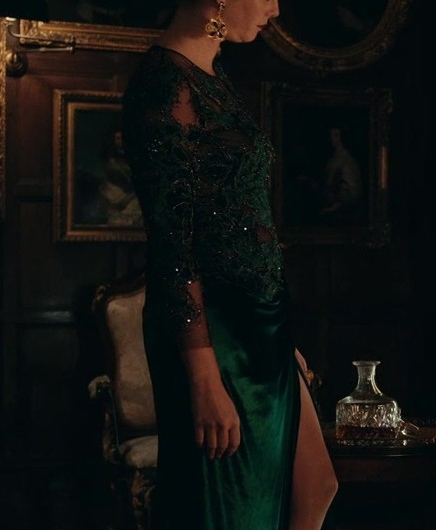 Opulent Green Velvet Dress with Sequin Embellishments Worn by Kaya Scodelario as Susie Glass