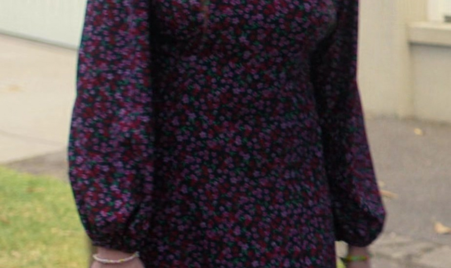 Floral Print Long-Sleeve Mini Dress with Ruffle Hem Worn by Apple Farrelly as Carly