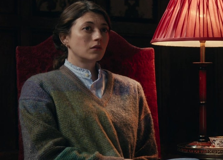 Multicolor V-Neck Knit Sweater Worn by Jasmine Blackborow as Charly “Chuckles” Horniman