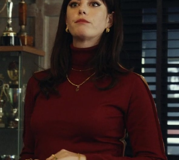 Half Red Half Beige Turtleneck Sweater Worn by Kaya Scodelario as Susie Glass