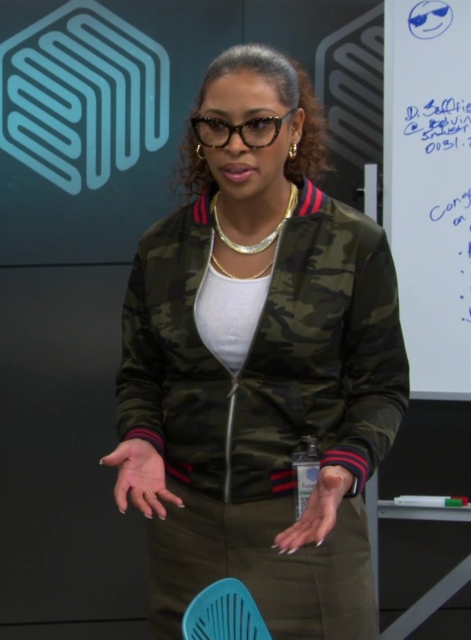 camo print bomber jacket with red and navy striped trim - Skye Townsend (Courtney) - The Neighborhood TV Show