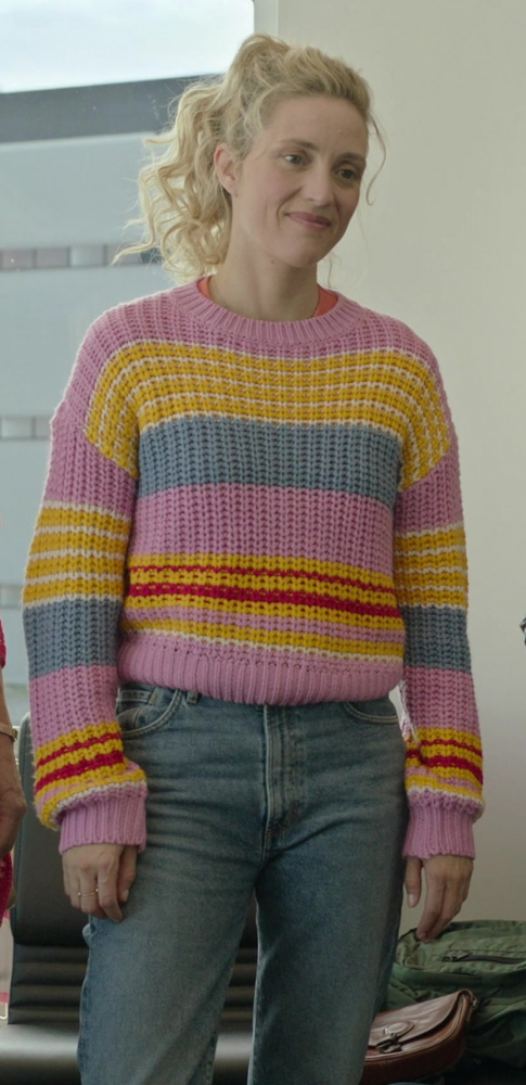 multicolor striped knit sweater in pink, yellow, and blue - Evelyne Brochu (Sophie Tremblay) - French Girl (2024) Movie