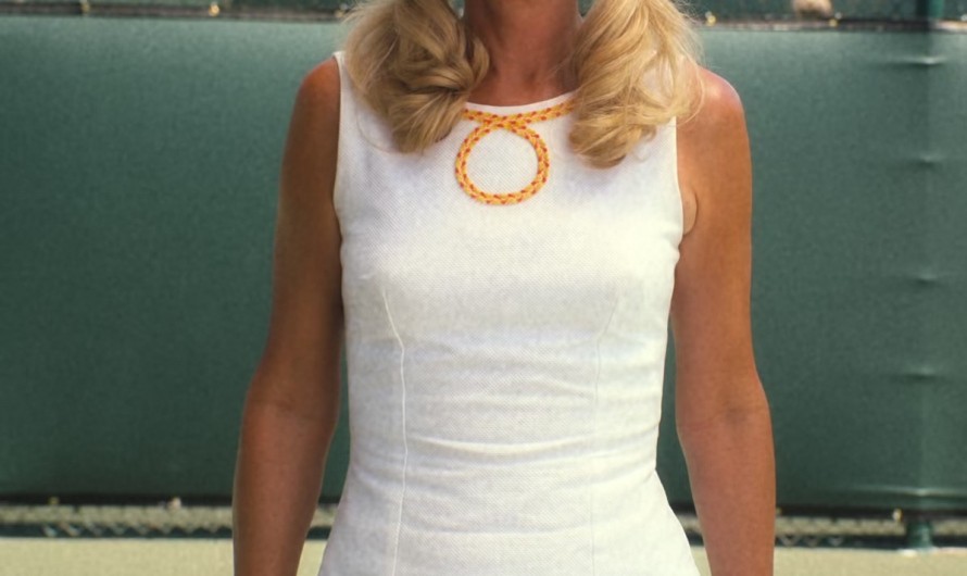 Classic Court White Sleeveless Tennis Dress with Orange Trim Worn by Kristen Wiig as Maxine Simmons