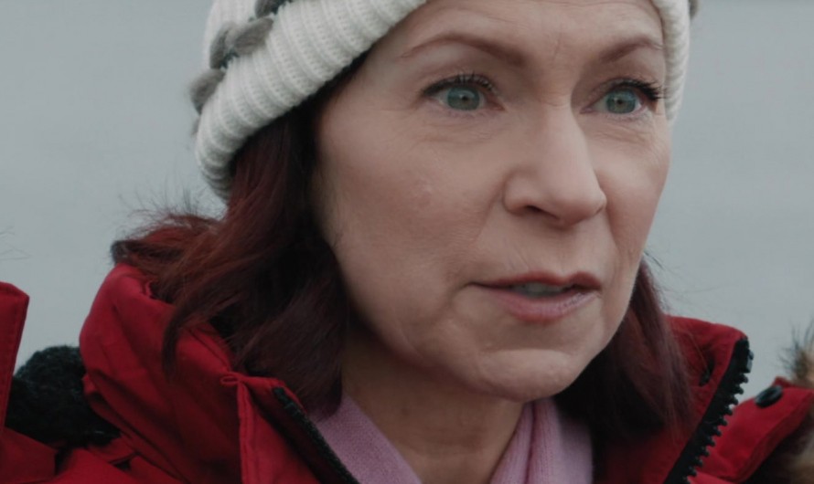 White Knit Beanie with Festive Green and Red Pattern Design Worn by Carrie Preston as Elsbeth Tascioni
