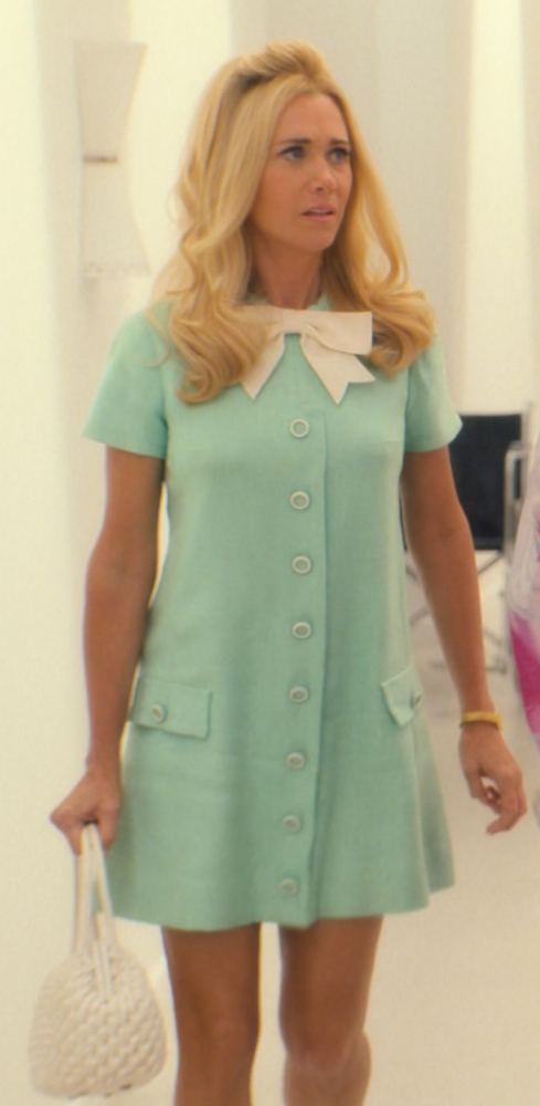 mint mini dress with buttons and bow tie - Kristen Wiig (Maxine Simmons) - Palm Royale TV Show