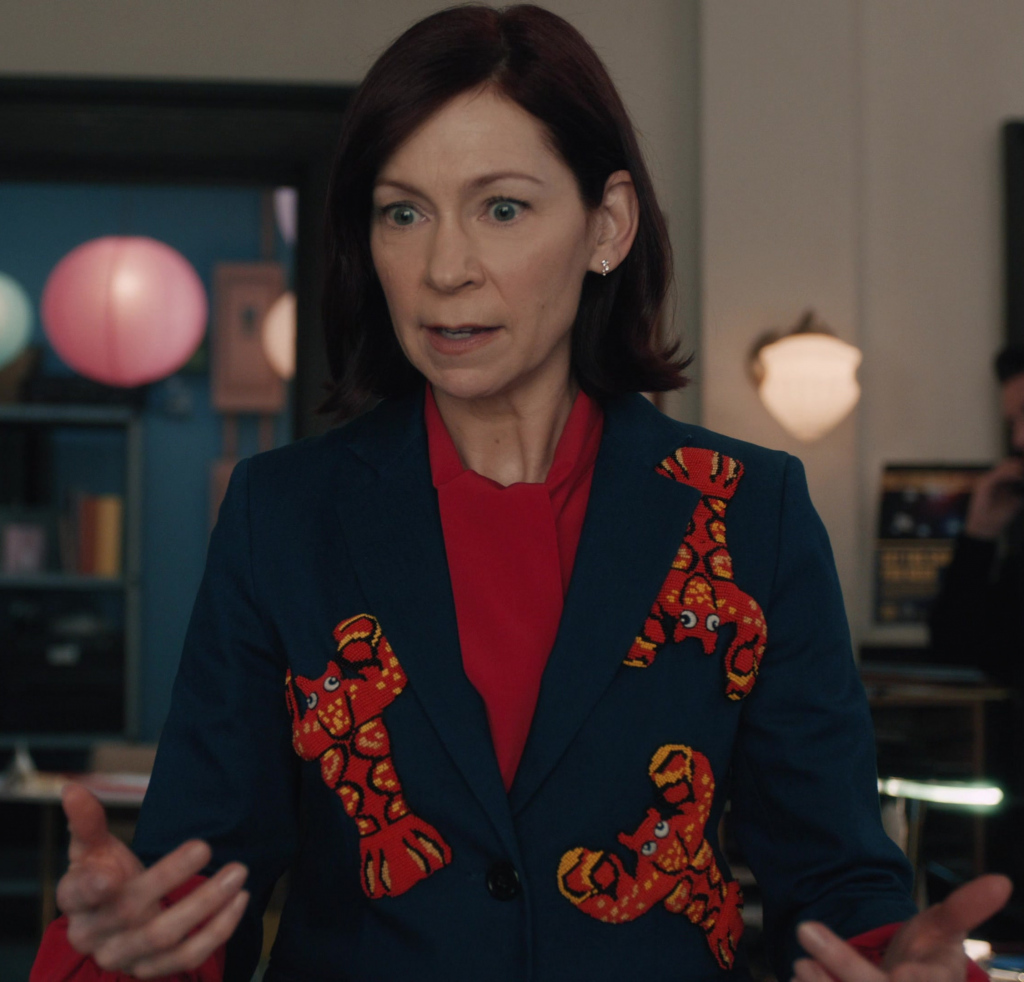 navy blue tailored blazer with bold red lobster embroidery - Carrie Preston (Elsbeth Tascioni) - Elsbeth TV Show