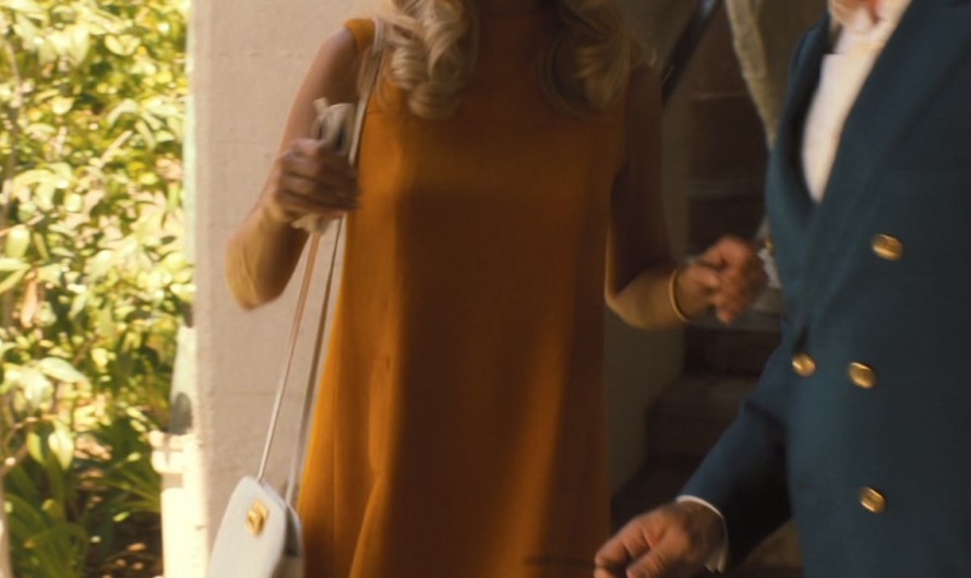 Orange Turtleneck Sleeveless Mini Dress of Kristen Wiig as Maxine Simmons