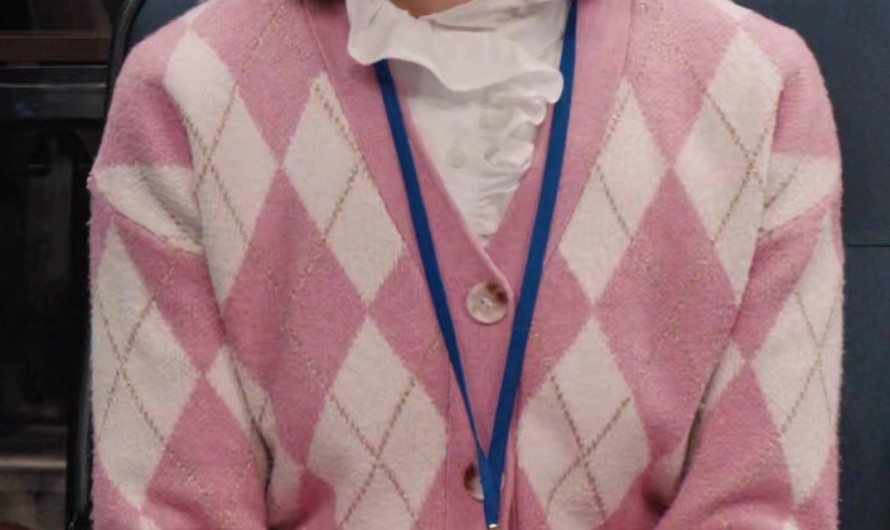 Pastel Pink Diamond Check Cardigan of Carrie Preston as Elsbeth Tascioni