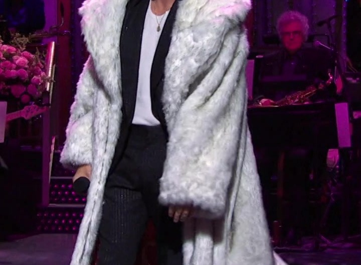 White Long Faux Fur Coat Worn by Ryan Gosling as Guest