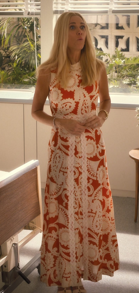 vintage inspired orange and white sleeveless dress - Kristen Wiig (Maxine Simmons) - Palm Royale TV Show
