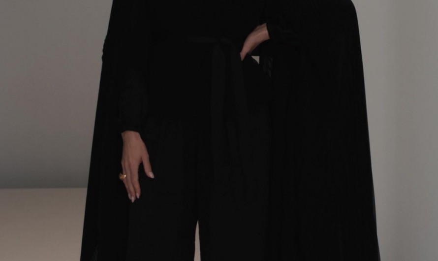 V-Neck Ruffled Sash Jumpsuit with Long Blouson Sleeves of Laura Benanti as Nadine Clay