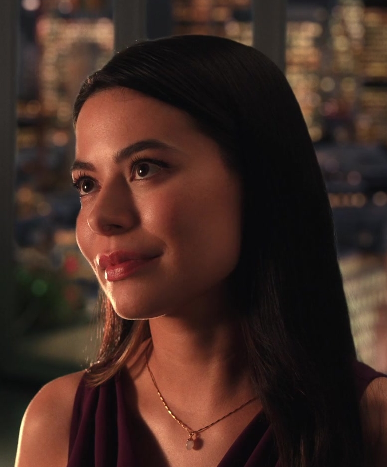 gold chain necklace with single gem pendant - Miranda Cosgrove (Emma) - Mother of the Bride (2024) Movie