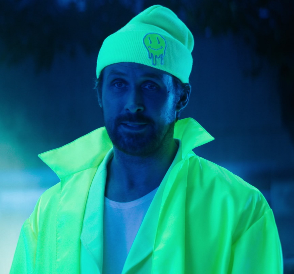 bright neon beanie with smiley face - Ryan Gosling (Colt Seavers) - The Fall Guy (2024) Movie