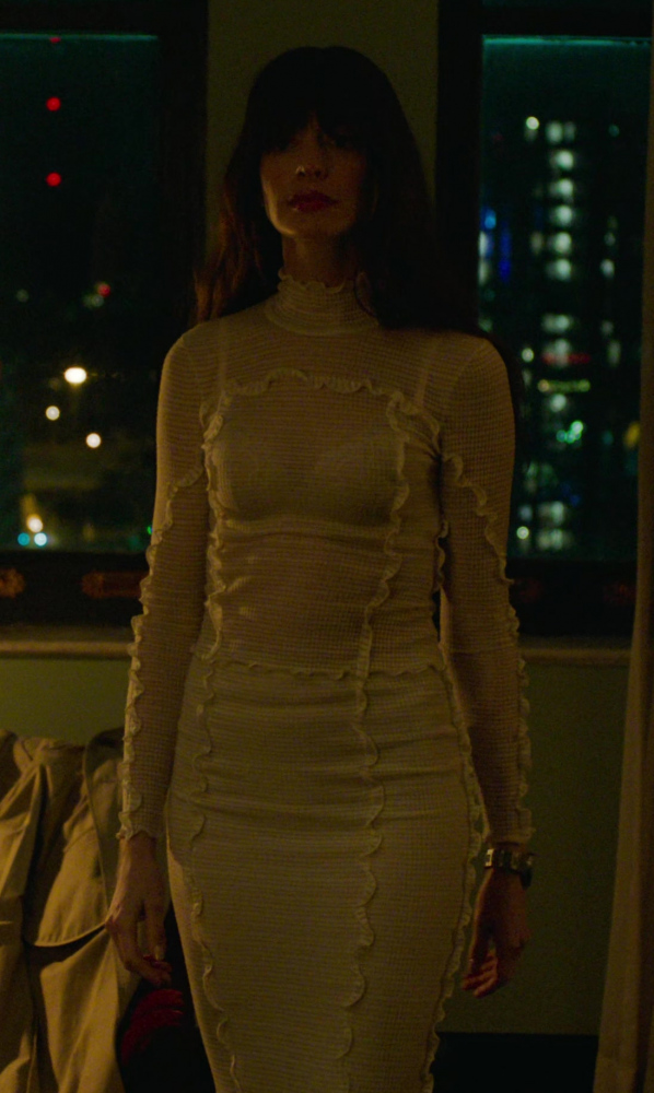 Elegant Cream Ribbed Lurex Knit Top and Skirt Set of Anne Hathaway as Solène