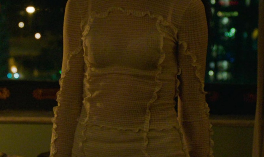 Elegant Cream Ribbed Lurex Knit Top and Skirt Set of Anne Hathaway as Solène