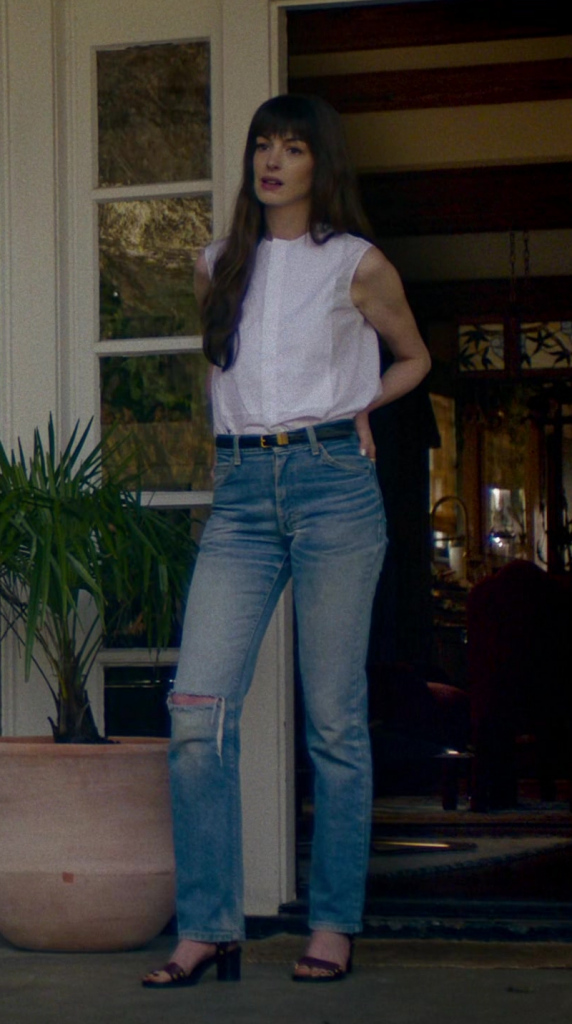 trendy straight leg jeans in light wash with casual ripped accents anne hathaway as solène -  (Solène) - The Idea of You (2024) Movie