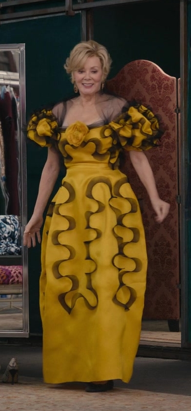 Vibrant Yellow Floral Gown with Dramatic Black Ruffle Detailing of Jean Smart as Deborah Vance