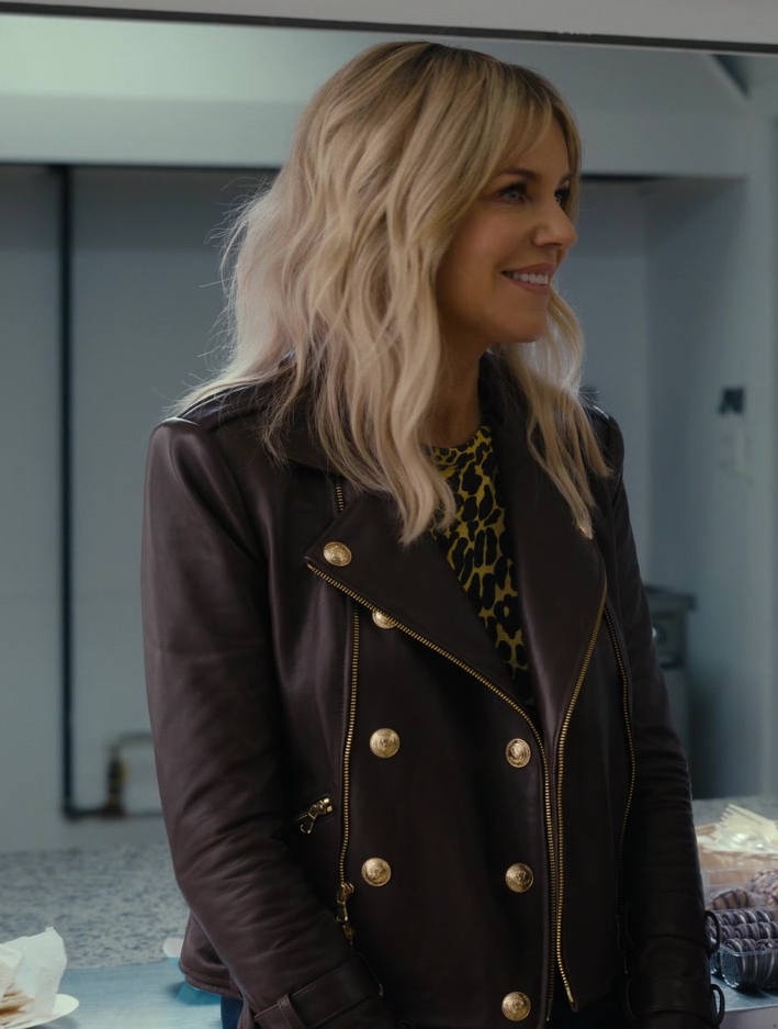 Brown Leather Biker Jacket with Gold Buttons of Kaitlin Olson as Deborah Vance