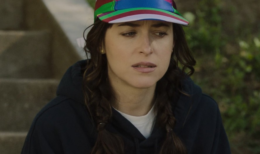 Colorful Striped Cap of Dakota Johnson as Lucy