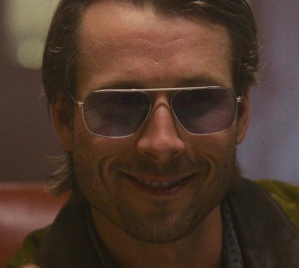 Silver Aviator Sunglasses with Sleek Metal Frame and Tinted Lenses of Glen Powell as Gary Johnson