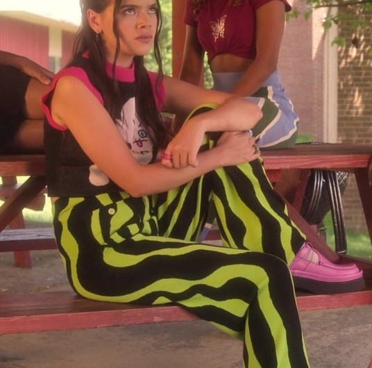 Vibrant Green and Black Striped Flared Pants of Malia Pyles as Minnie “Mouse” Honrada