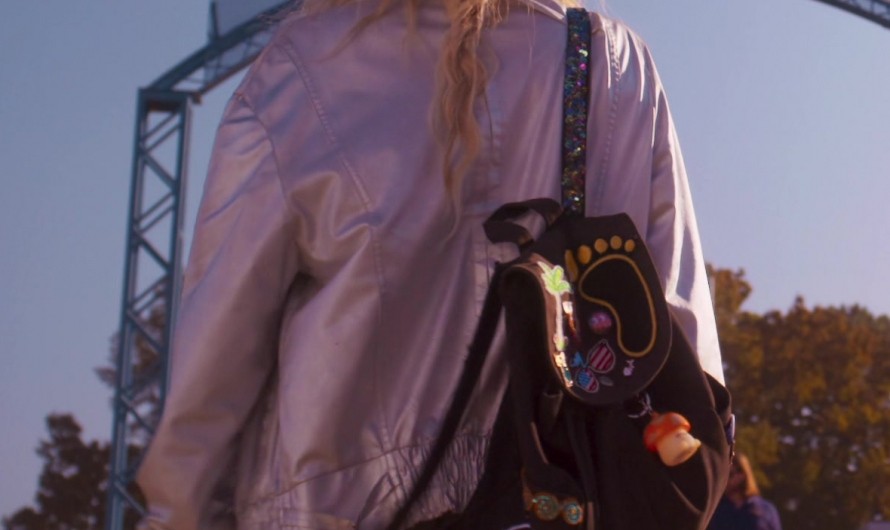 Black Backpack with Fun Patches and Peace Sign of Emma Roberts as Rex Simpson