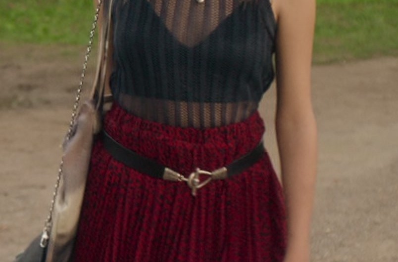 Black Sheer Mock Neck Top of Victoria Bazúa as Kate